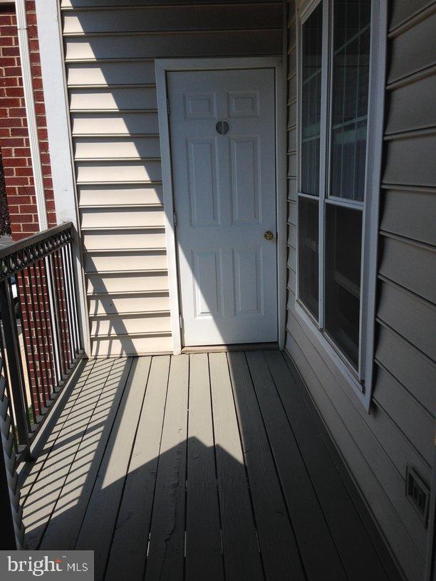 1571 Spring Gate Dr., Unit 6209 McLean, VA 22102 - Photo 6 of 7 a view of wooden balcony