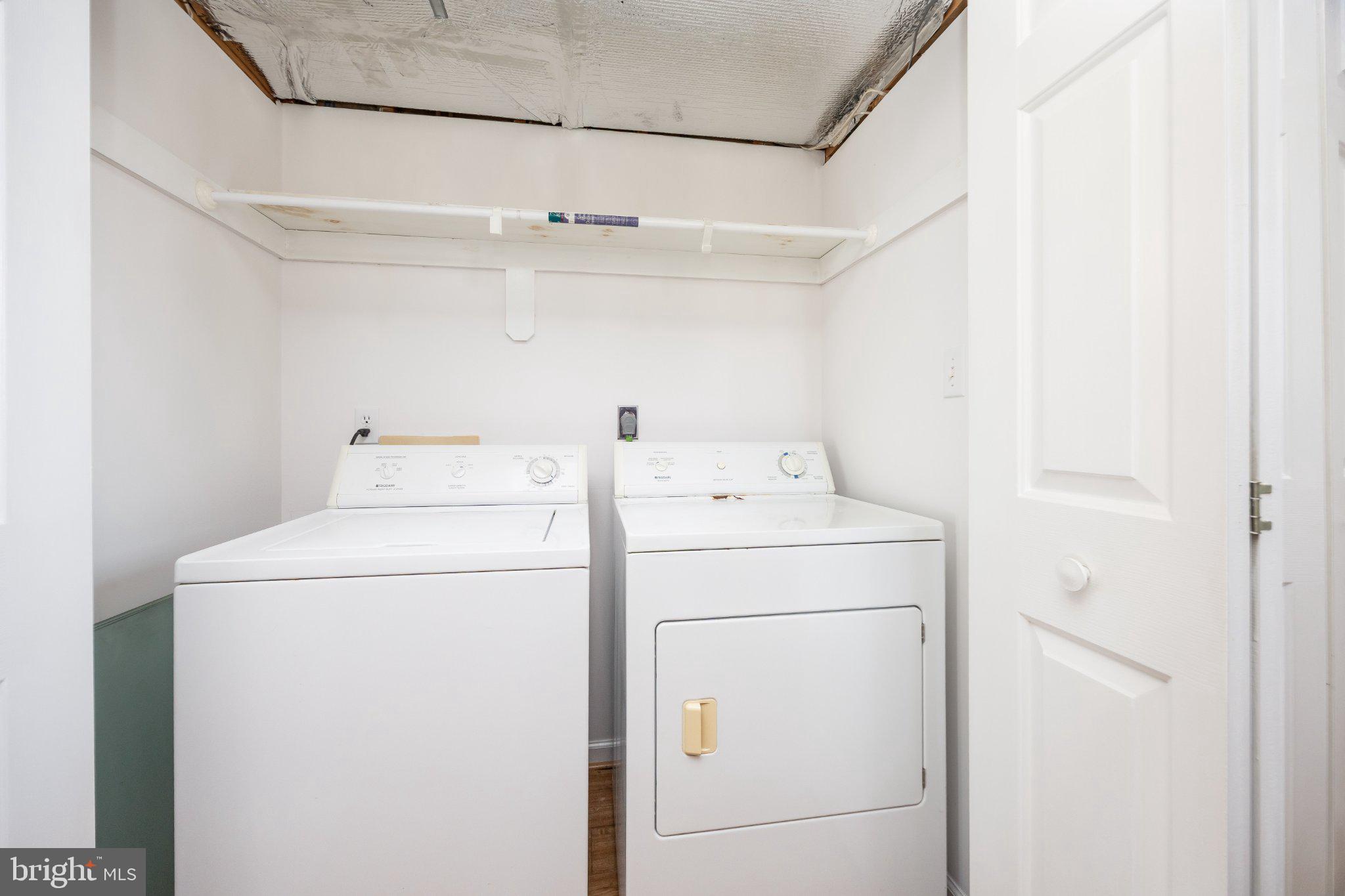 10431 Brighton Road Ocean City, MD 21842 - Photo 21 of 39 Efficient laundry space for modern living.