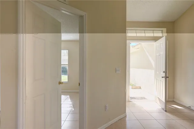 a kitchen with granite countertop white cabinets white appliances and a granite counter tops