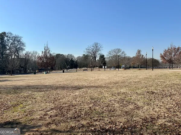 a view of a swimming pool with a bench