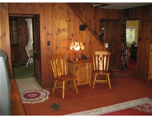 435 Cliff Road Baden, PA 15005 - Photo 13 of 17 Living Room. Knotty pine rooms and staircase to 2nd floor