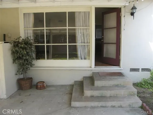 a view of entrance and door