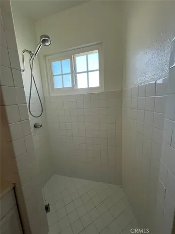 a bathroom that has a shower sink