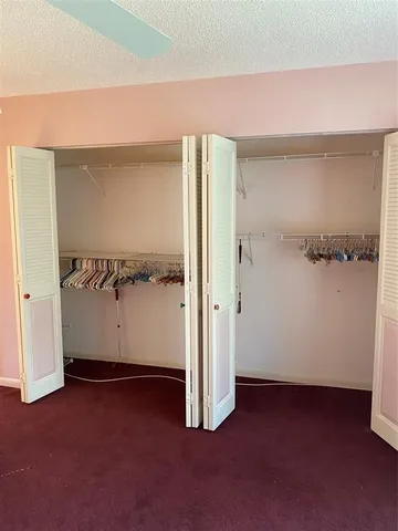 an empty room with closet