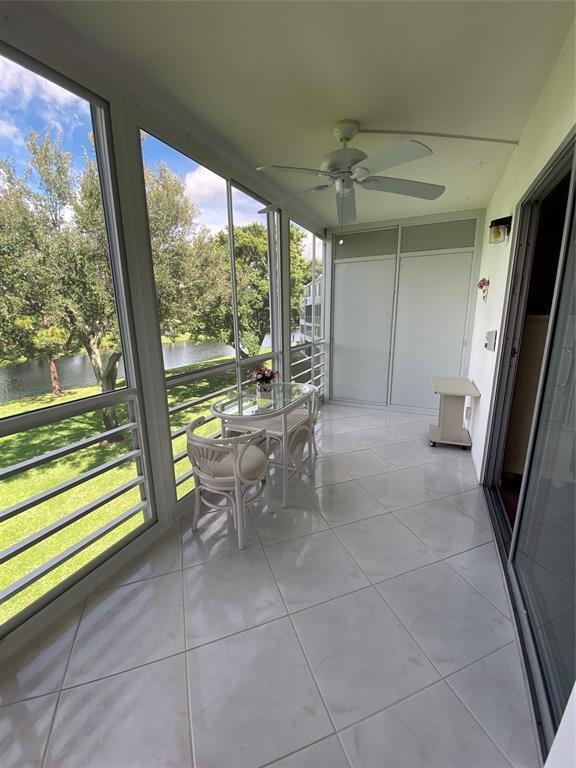 3012 Westbury F, Unit 3012 Deerfield Beach, FL 33442 - Photo 15 of 54 a view of a room with a large window