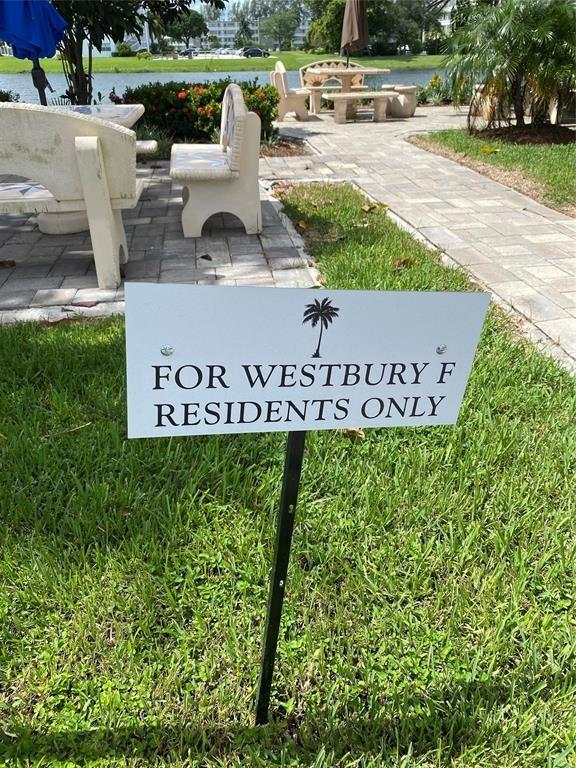 3012 Westbury F, Unit 3012 Deerfield Beach, FL 33442 - Photo 21 of 54 a view of garden with patio