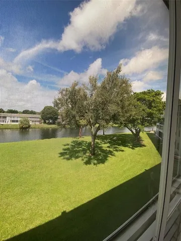 a view of a lake with a city