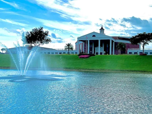 a view of swimming pool with outdoor seating