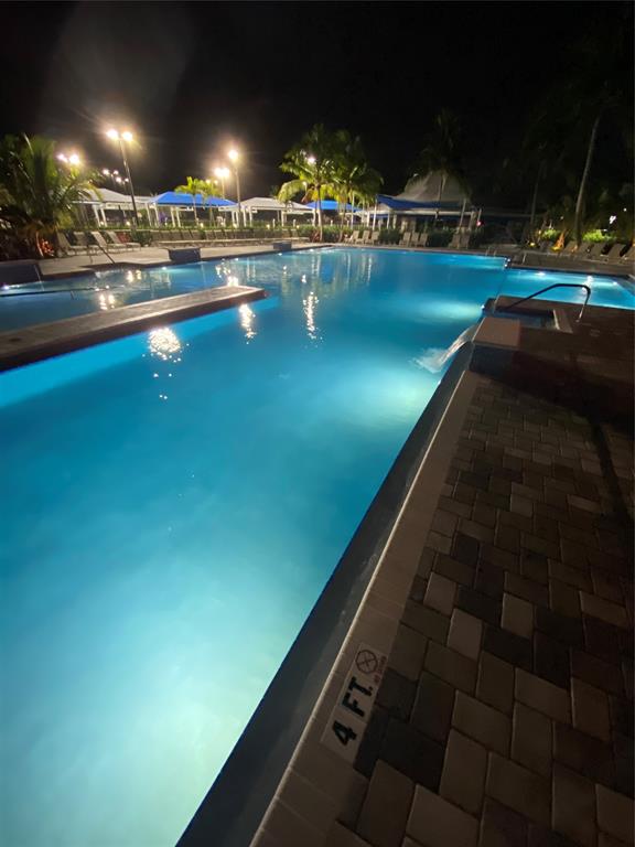 3012 Westbury F, Unit 3012 Deerfield Beach, FL 33442 - Photo 47 of 54 a view of swimming pool and outdoor space