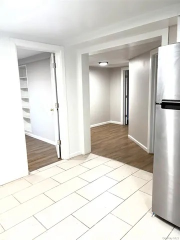 a picture of a white wall with a white wall and a picture