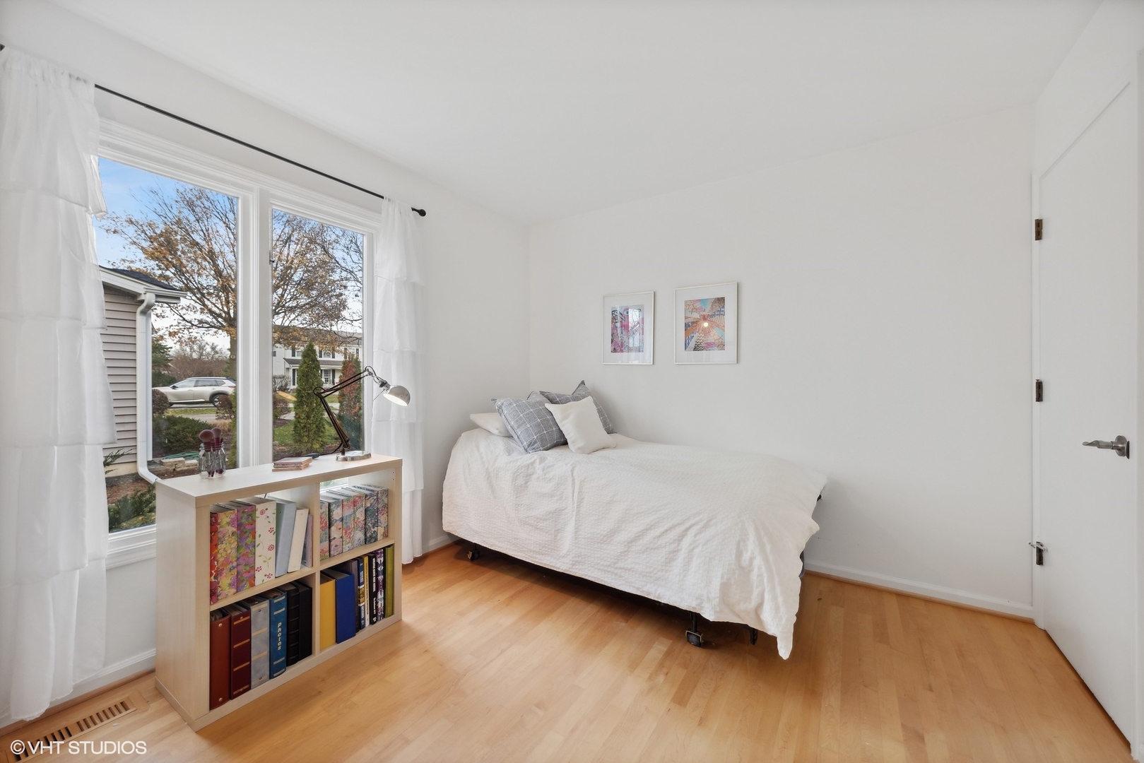 1908 Cherry Street Wheaton, IL 60187 - Photo 16 of 36 a bedroom with a bed and a large window
