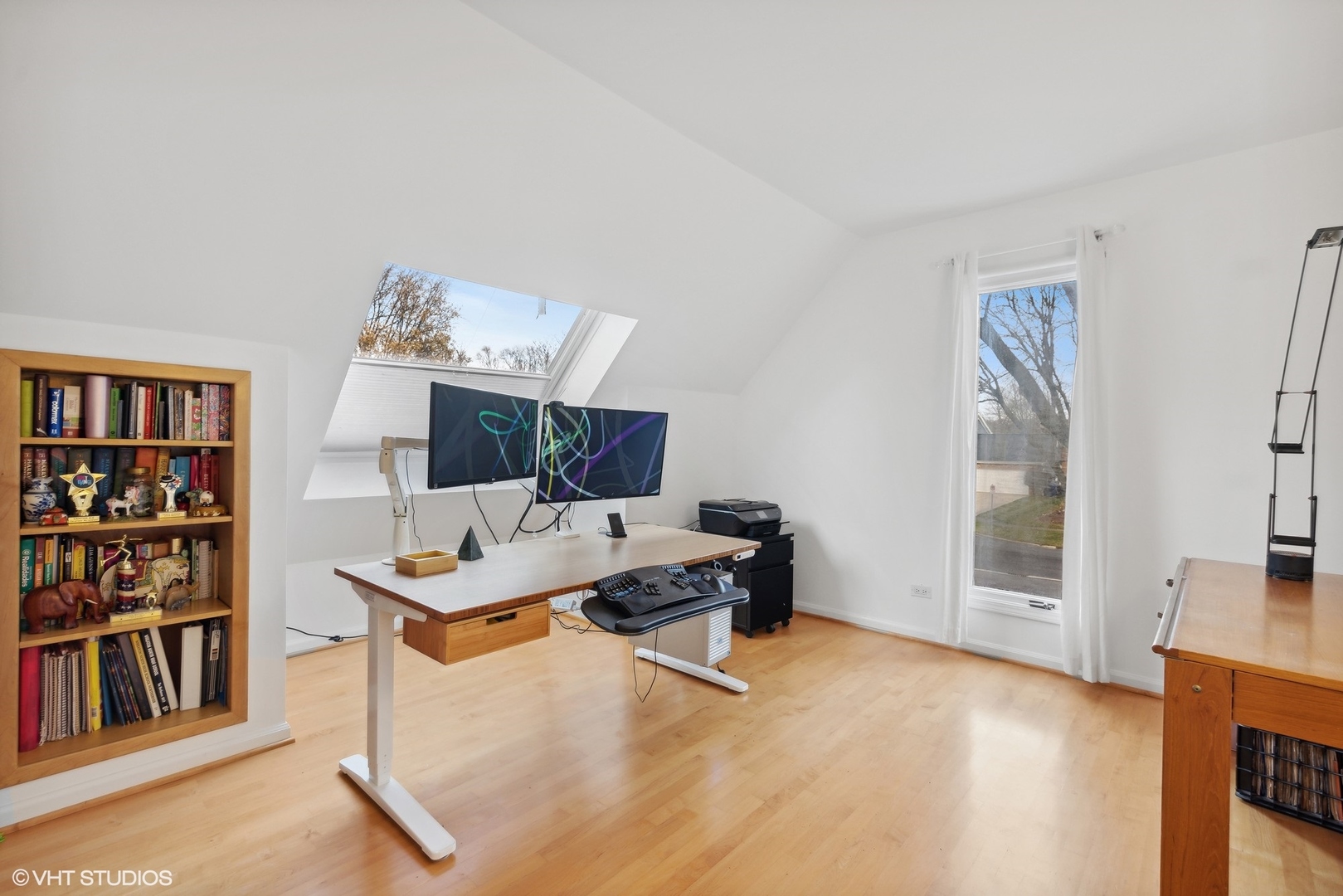 1908 Cherry Street Wheaton, IL 60187 - Photo 17 of 36 a view of a workspace with furniture and bookshelf
