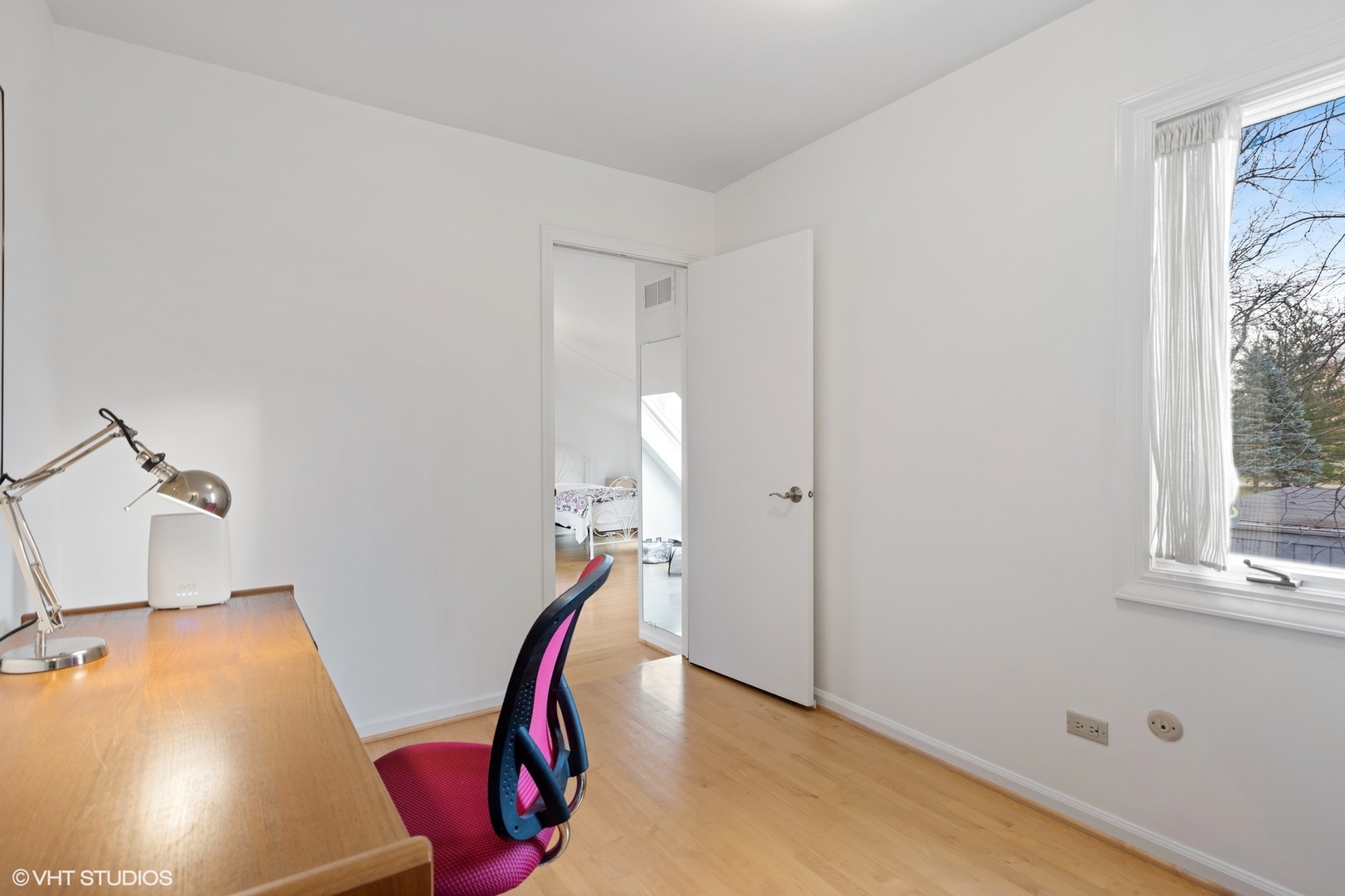 1908 Cherry Street Wheaton, IL 60187 - Photo 18 of 36 a view of a gallery with window