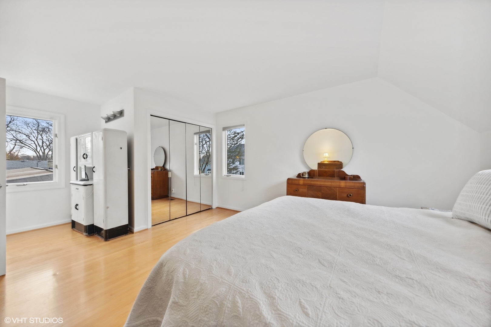 1908 Cherry Street Wheaton, IL 60187 - Photo 23 of 36 a bedroom with a bed and cabinets
