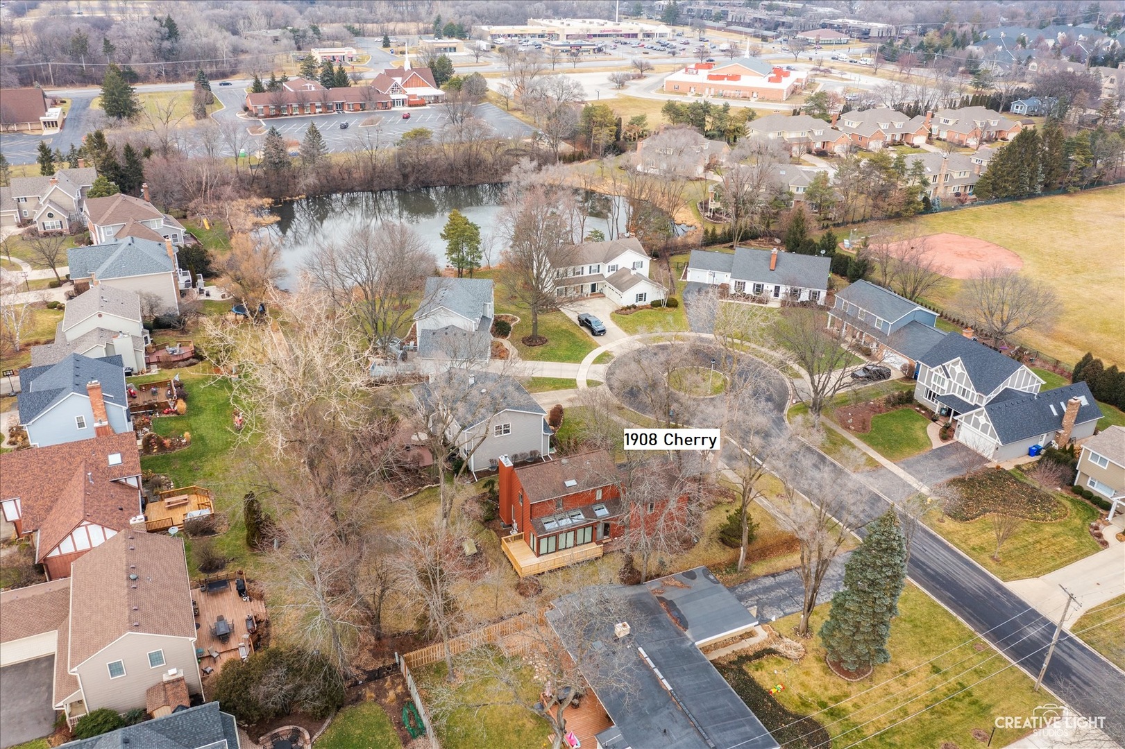 1908 Cherry Street Wheaton, IL 60187 - Photo 31 of 36 an aerial view of residential houses with outdoor space