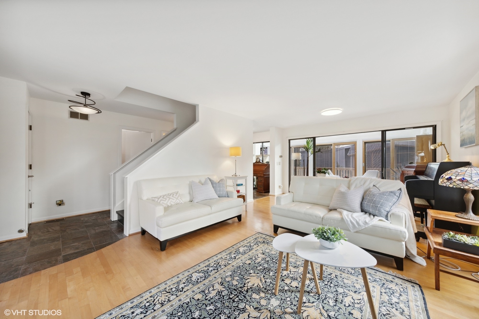 1908 Cherry Street Wheaton, IL 60187 - Photo 6 of 36 a living room with furniture and a rug