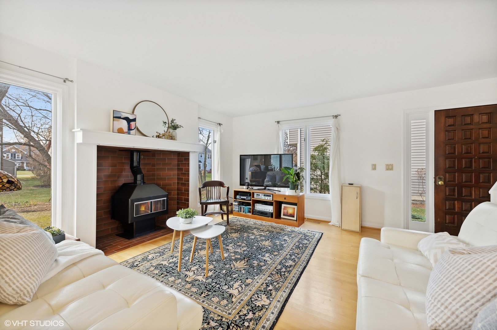1908 Cherry Street Wheaton, IL 60187 - Photo 7 of 36 a living room with furniture and a fireplace