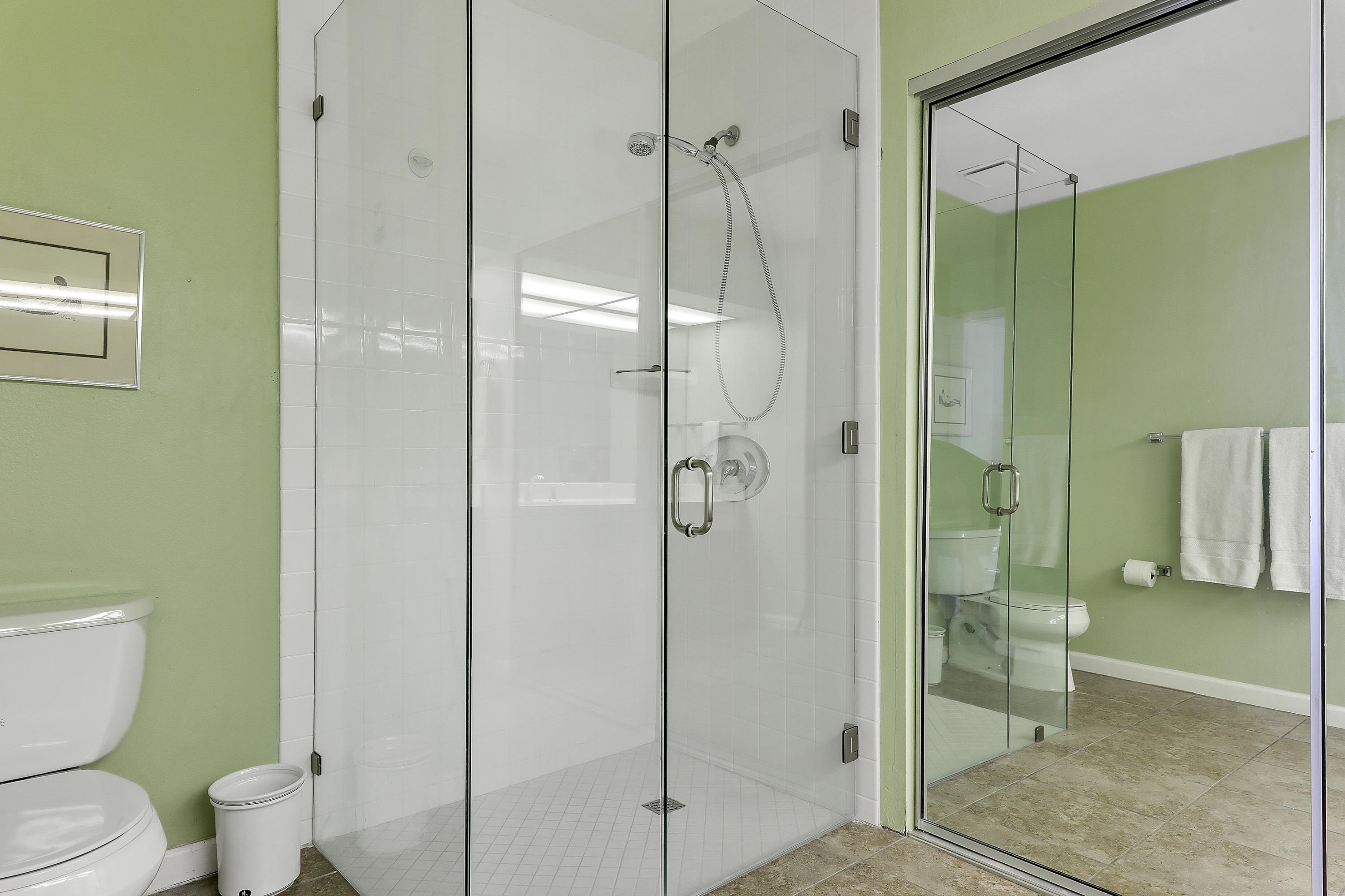 4 Leon Way Rancho Mirage, CA 92270 - Photo 12 of 20 a bathroom with a shower and toilet