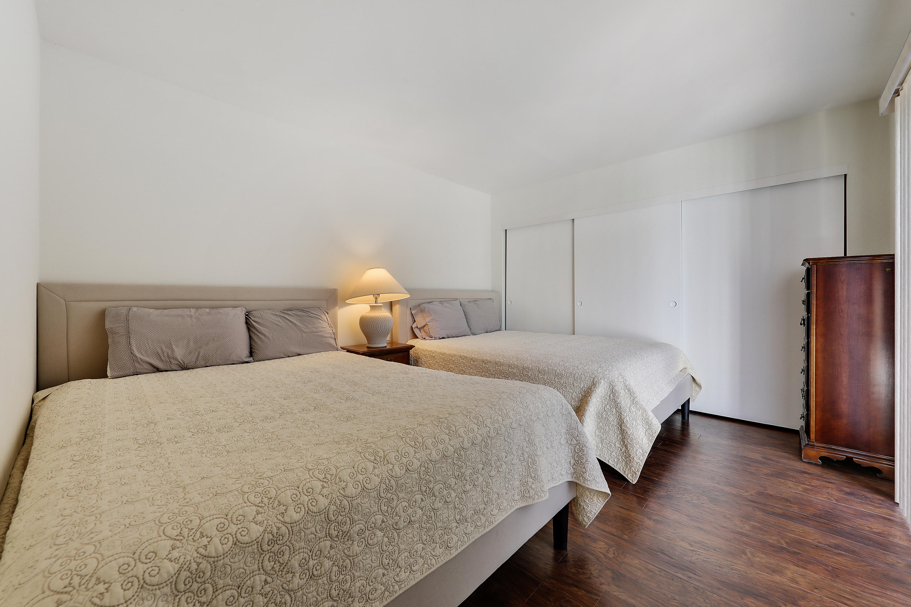 4 Leon Way Rancho Mirage, CA 92270 - Photo 13 of 20 a bedroom with bed and wooden floor