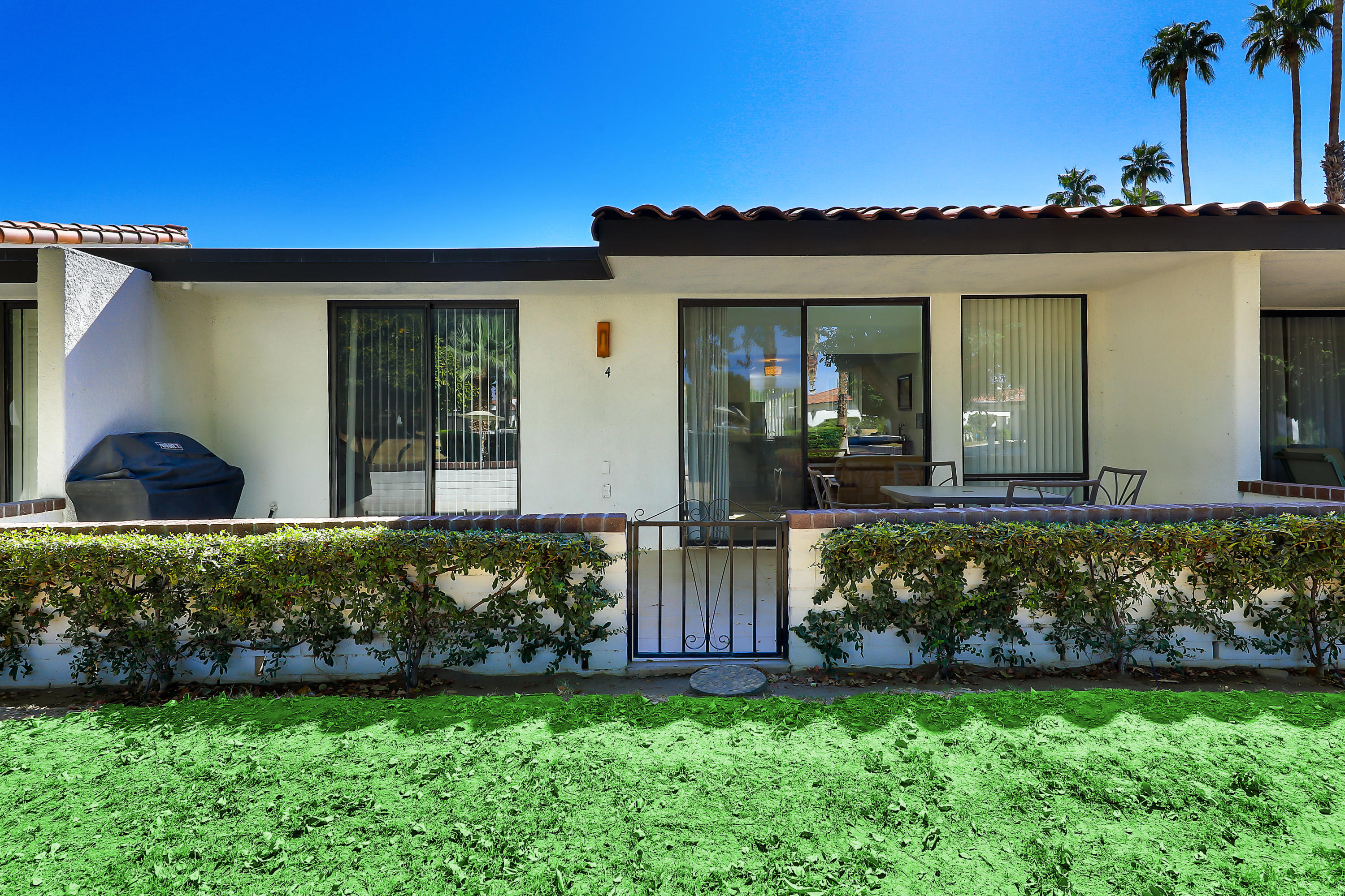 4 Leon Way Rancho Mirage, CA 92270 - Photo 20 of 20 front view of a house with a yard