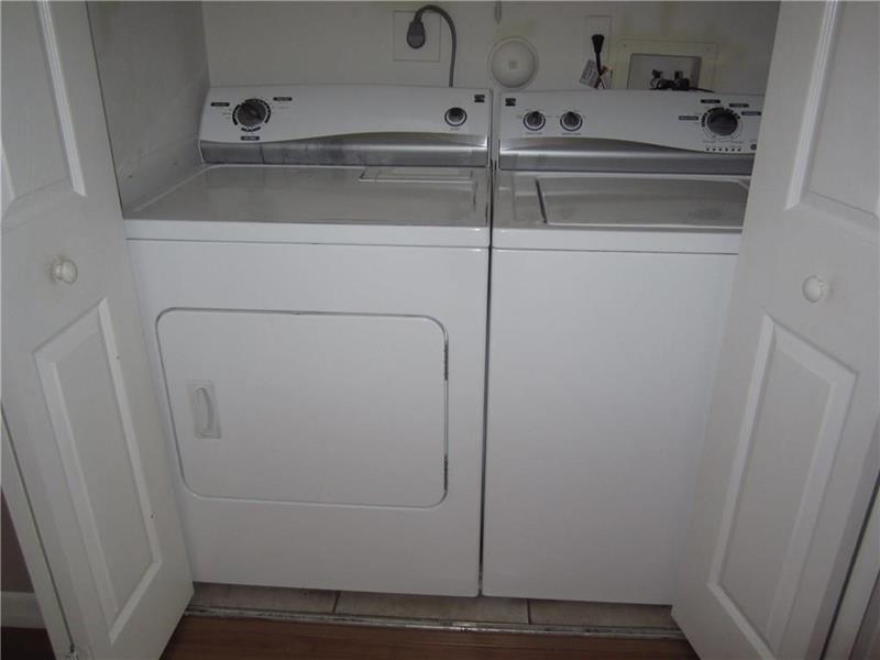 751 Lyons Road, Unit 18102 Coconut Creek, FL 33063 - Photo 6 of 9 a close view of washer and dryer