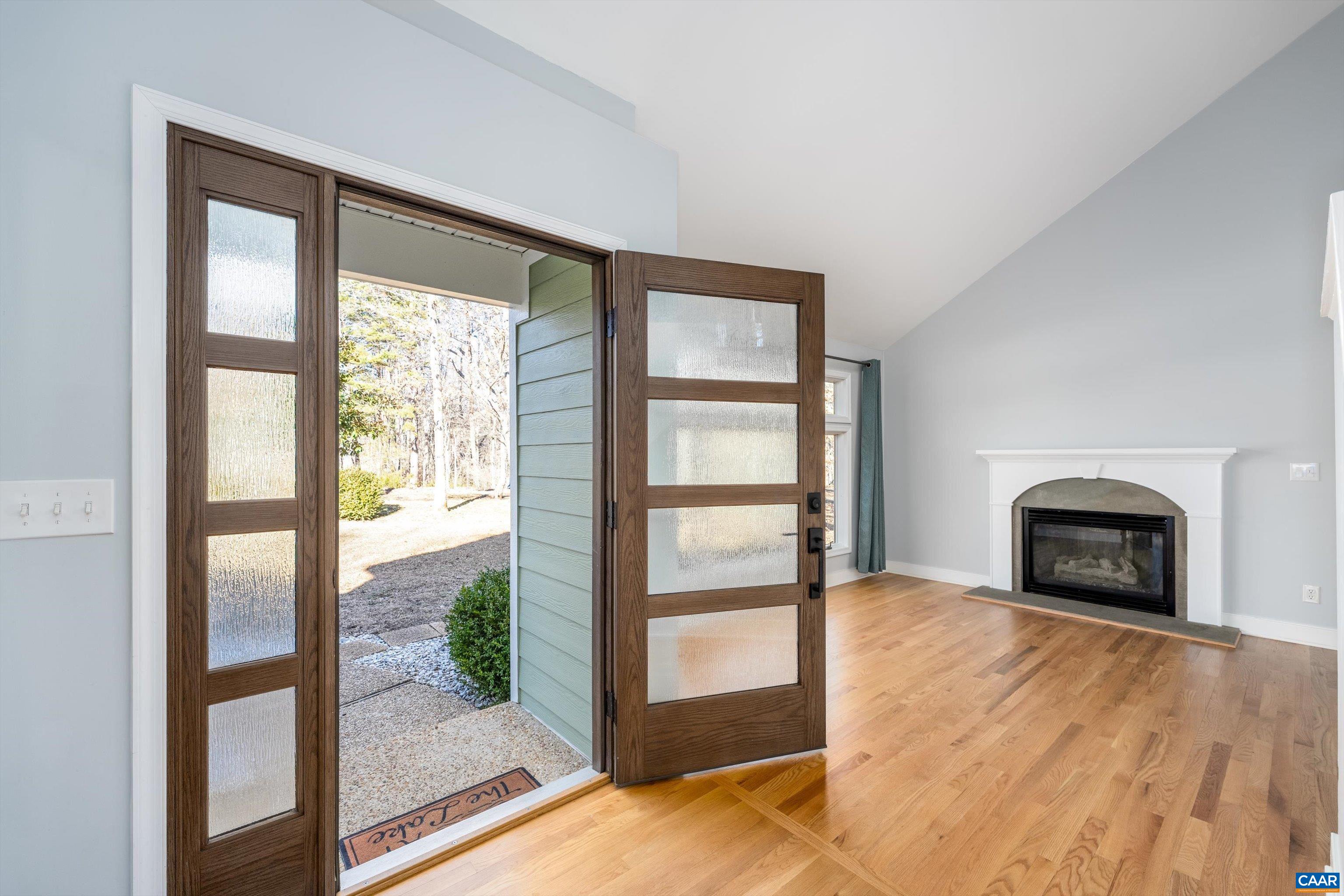 9 Vine Ridge Drive Palmyra, VA 22963 - Photo 41 of 72 a view of empty room with floor to ceiling window and wooden floor