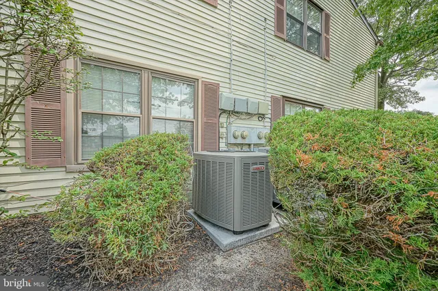 a view of a park with swings and slides