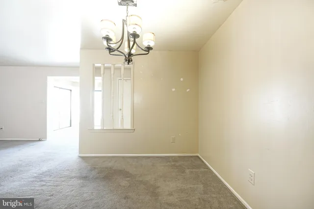 a view of a chandelier in a room