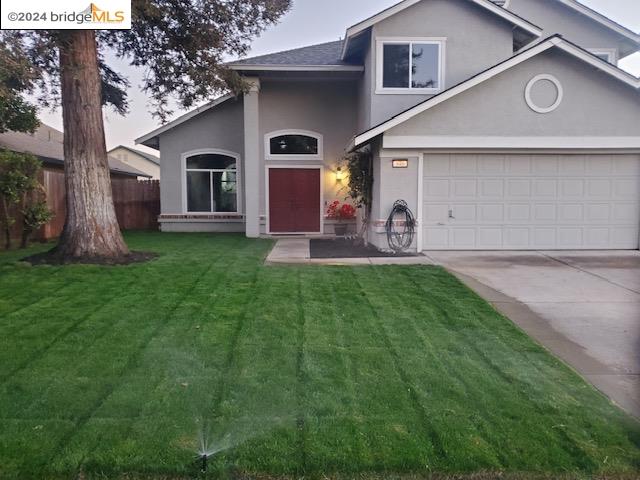 949 Stonegate Circle Oakley, CA 94561 - Photo 1 of 1 a front view of house with yard and outdoor seating