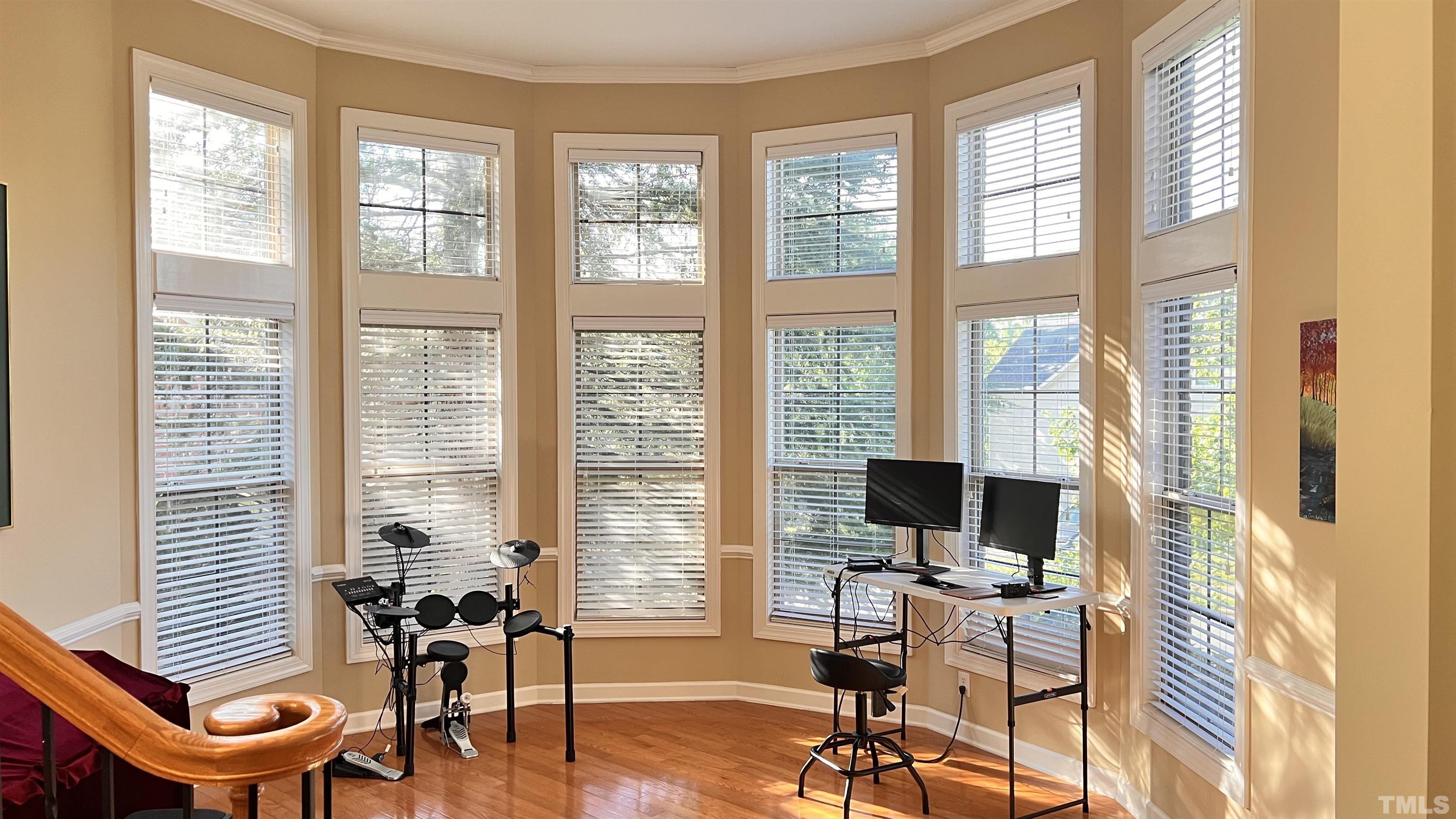 309 Parish House Road Cary, NC 27513 - Photo 3 of 33 a view of a livingroom with workspace and a window