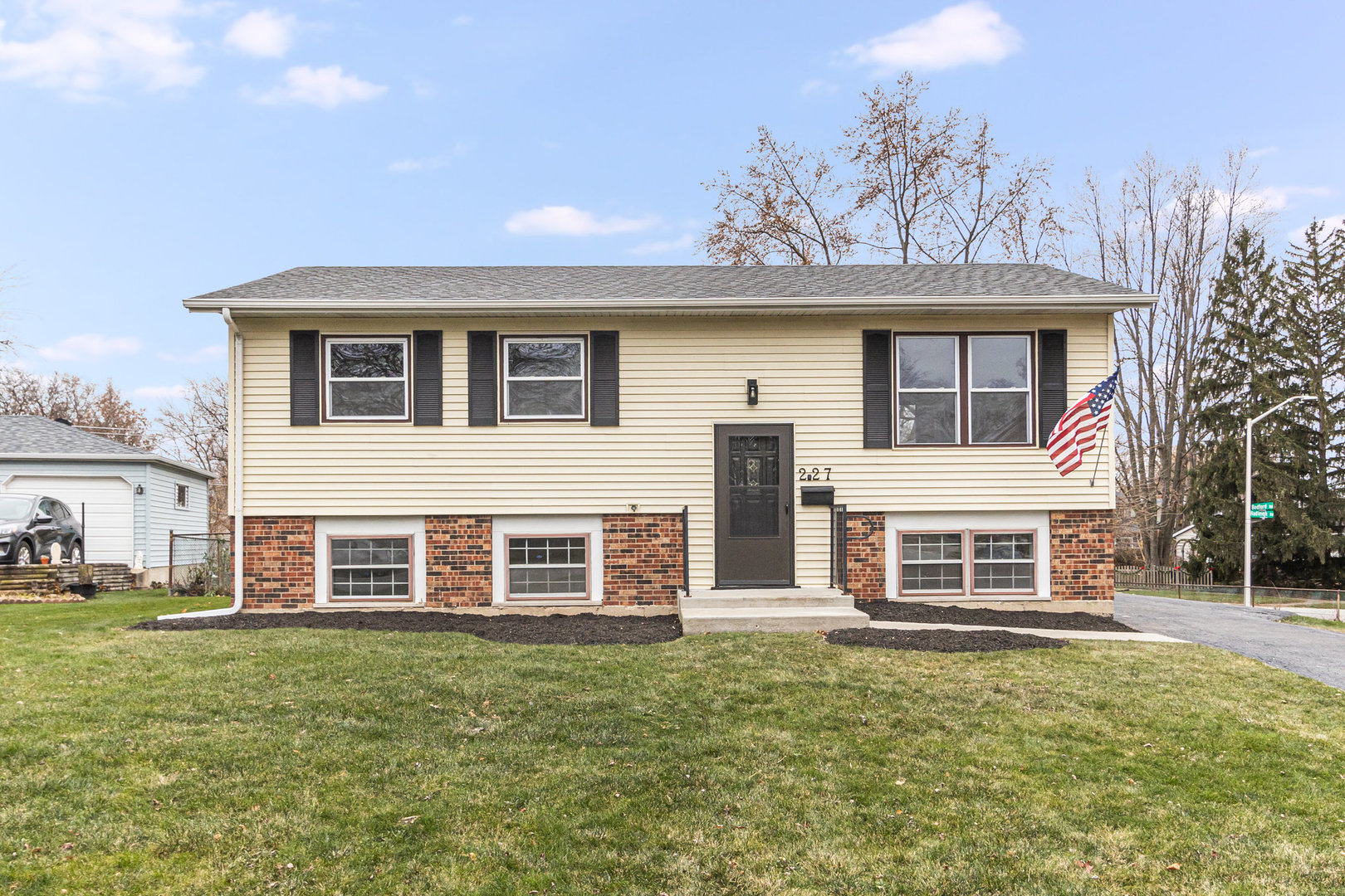 227 Hadleigh Road Bolingbrook, IL 60440 - Photo 1 of 19 a front view of a house with a garden