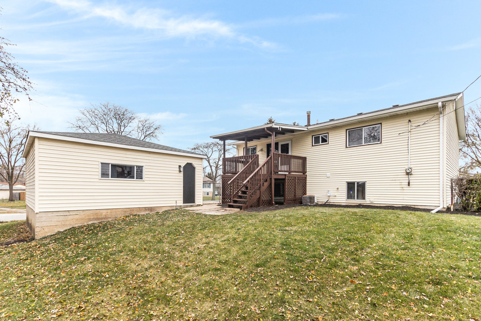 227 Hadleigh Road Bolingbrook, IL 60440 - Photo 16 of 19 a view of a house with a yard
