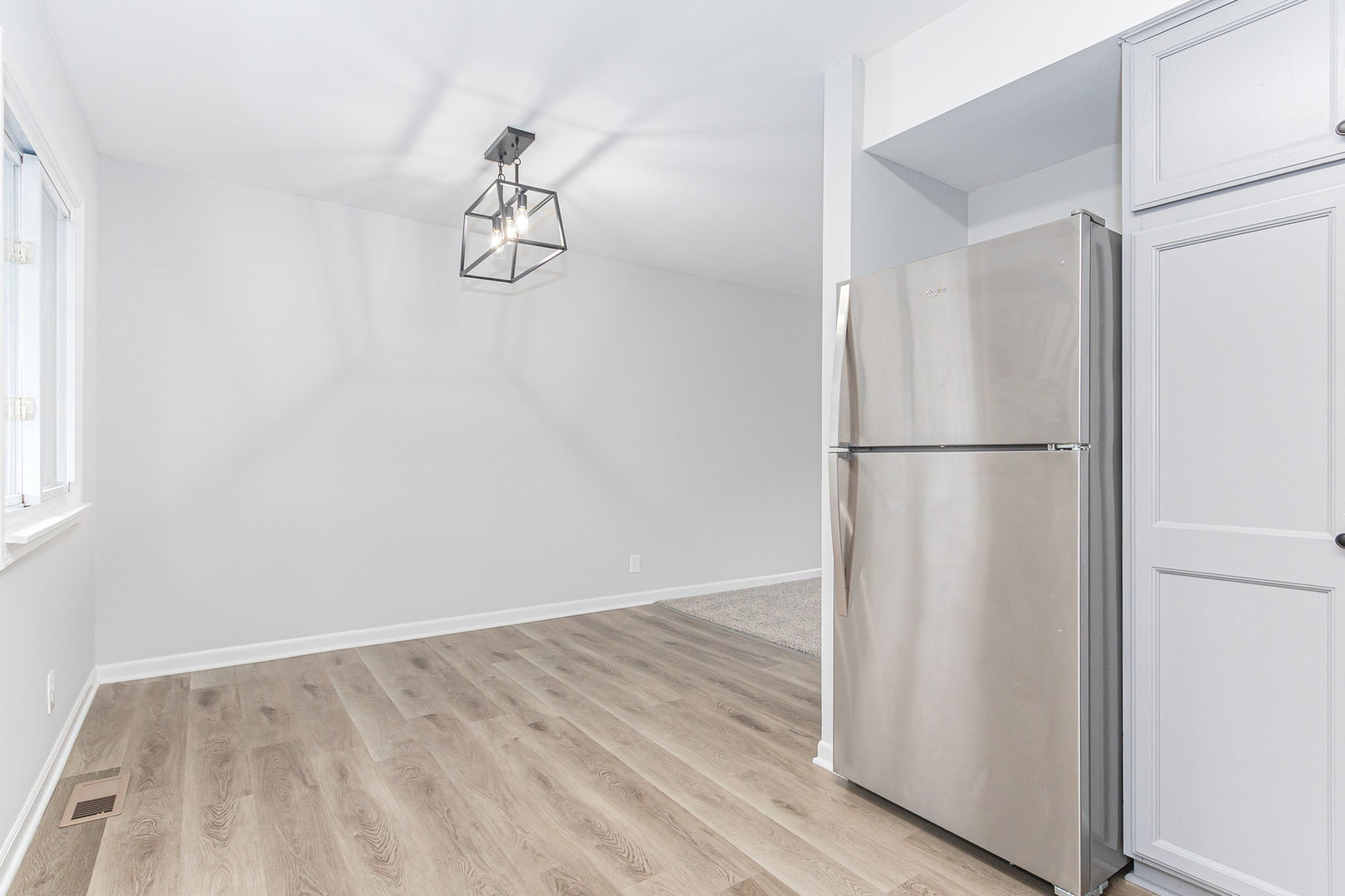 227 Hadleigh Road Bolingbrook, IL 60440 - Photo 6 of 19 a view of small space with wooden floor