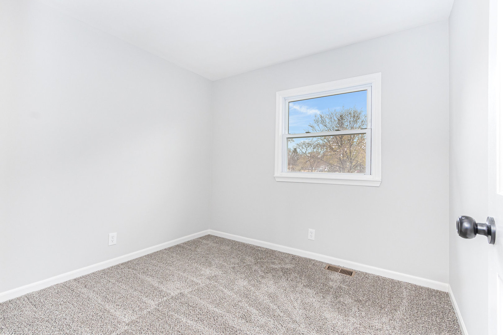 227 Hadleigh Road Bolingbrook, IL 60440 - Photo 9 of 19 an empty room with a window