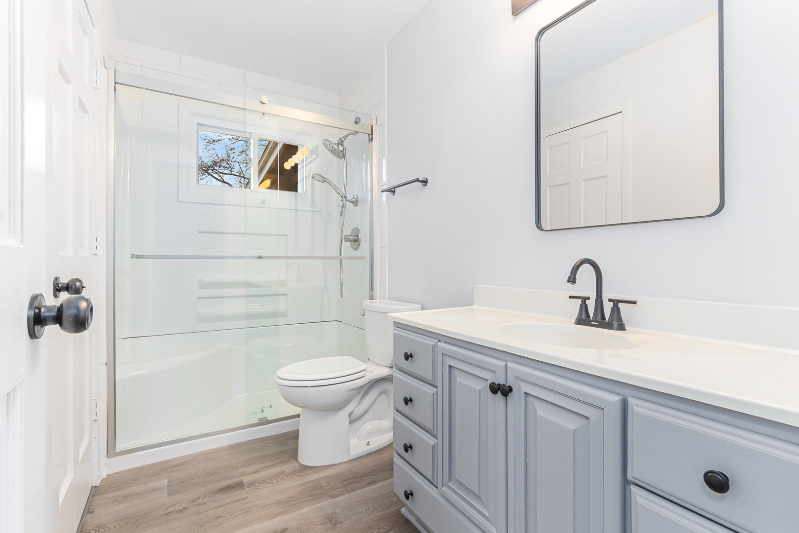 227 Hadleigh Road Bolingbrook, IL 60440 - Photo 10 of 19 a bathroom with a sink toilet and shower