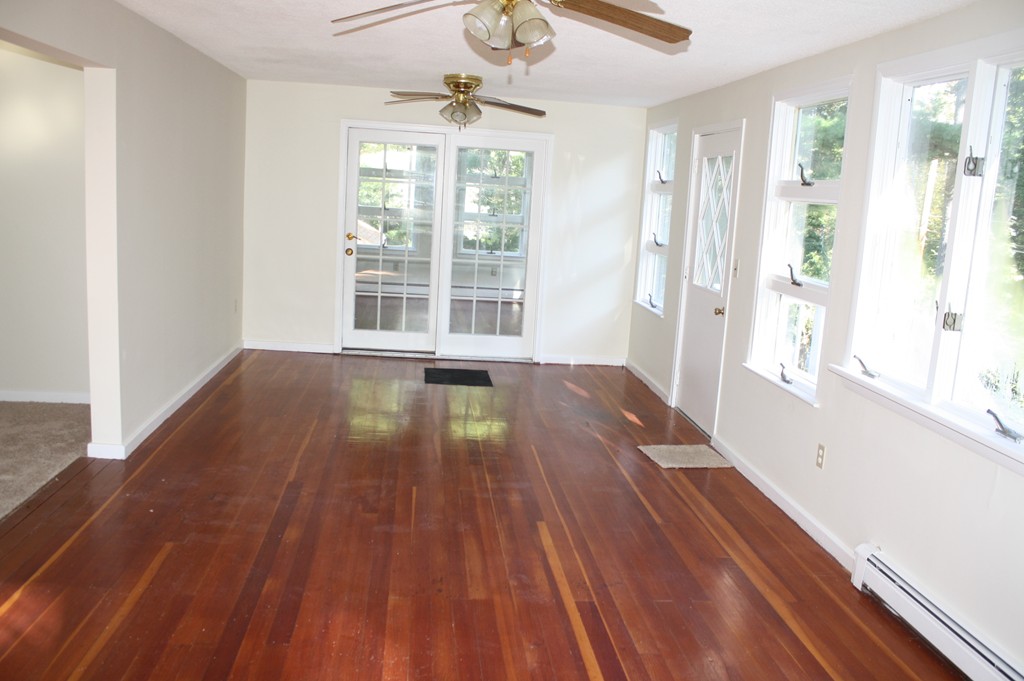 1985 South Athol Road Athol, MA 01331 - Photo 11 of 19 a view of an empty room with wooden floor and a window
