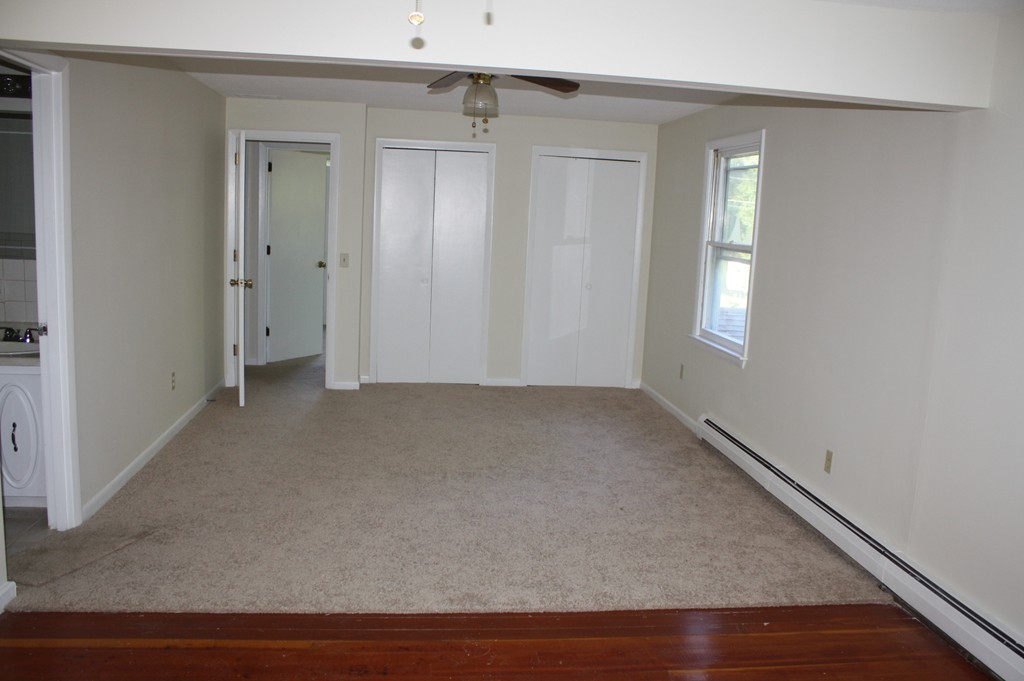 1985 South Athol Road Athol, MA 01331 - Photo 12 of 19 an empty room with wooden floor and windows