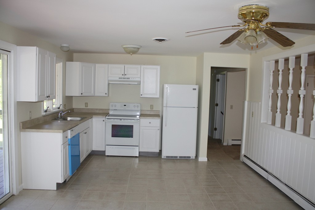 1985 South Athol Road Athol, MA 01331 - Photo 6 of 19 a kitchen with a stove a sink and a refrigerator