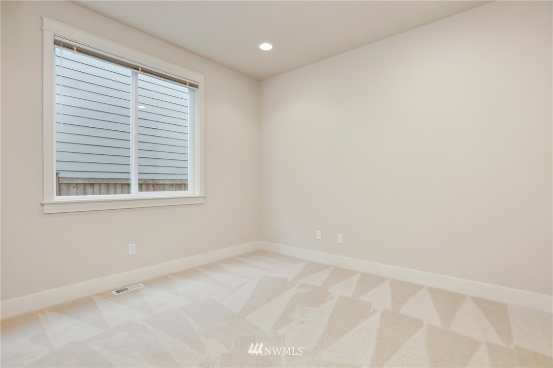 4014 167th Street Southeast Bothell, WA 98012 - Photo 17 of 39 an empty room with a window