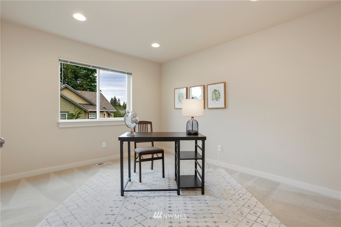 4014 167th Street Southeast Bothell, WA 98012 - Photo 19 of 39 a workspace with furniture and window