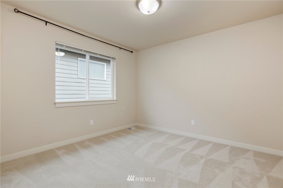4014 167th Street Southeast Bothell, WA 98012 - Photo 27 of 39 an empty room with a window