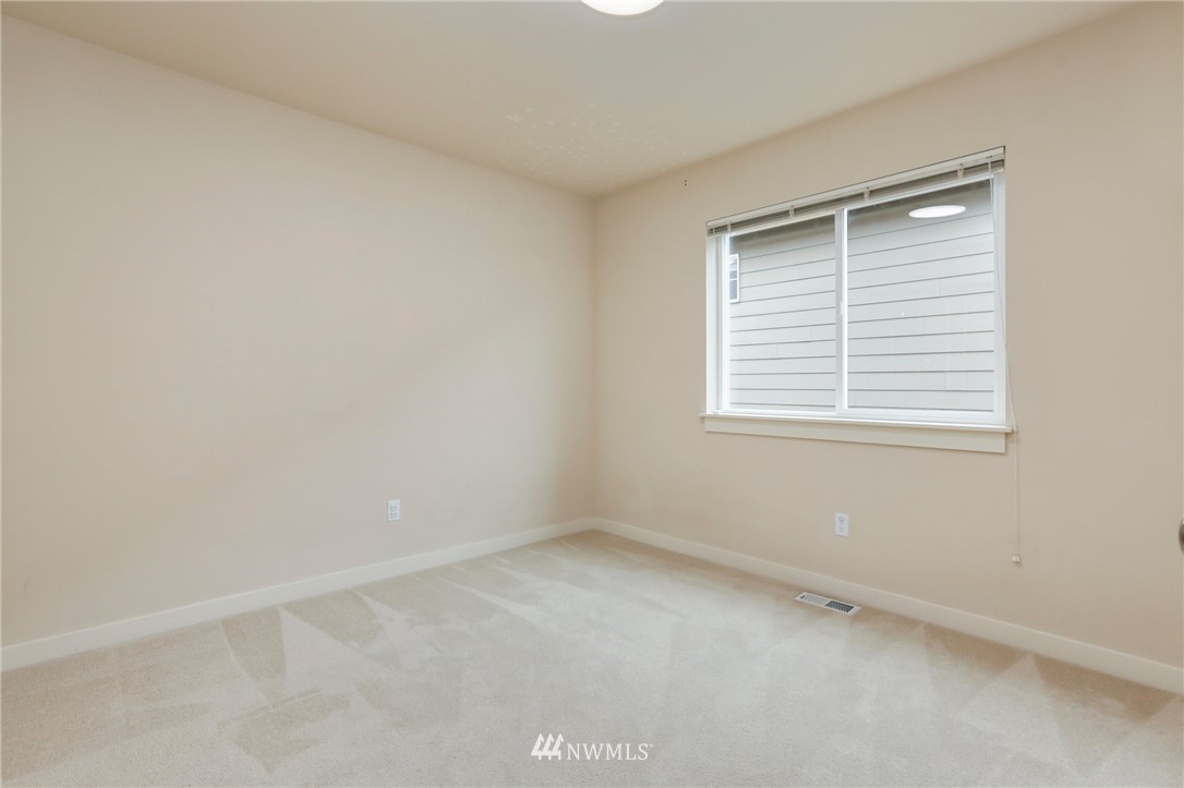 4014 167th Street Southeast Bothell, WA 98012 - Photo 28 of 39 an empty room with a window