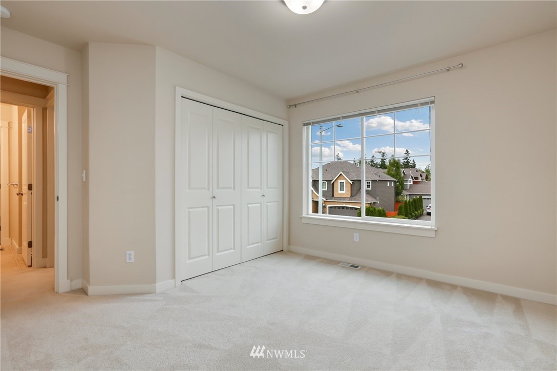 4014 167th Street Southeast Bothell, WA 98012 - Photo 29 of 39 an empty room with windows