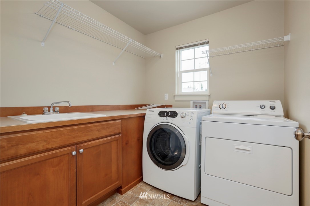 4014 167th Street Southeast Bothell, WA 98012 - Photo 31 of 39 a utility room with dryer and washer