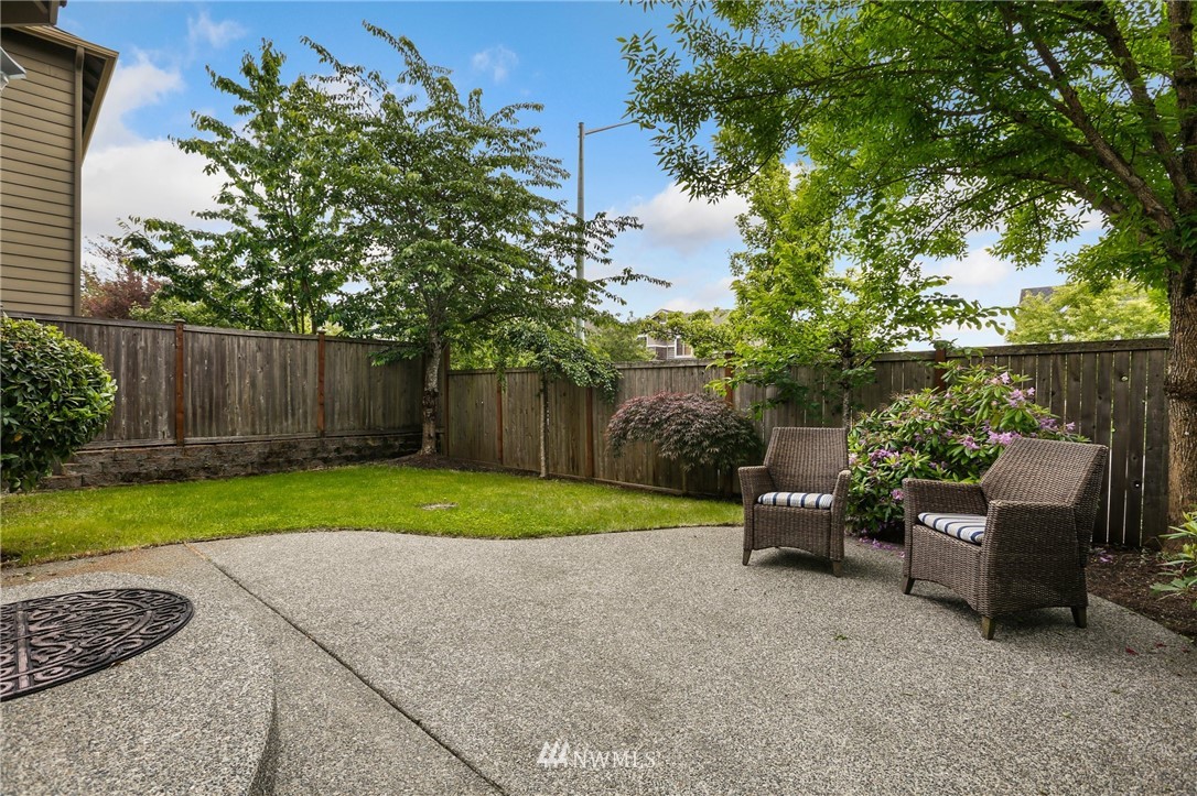4014 167th Street Southeast Bothell, WA 98012 - Photo 33 of 39 a view of backyard with outdoor seating and green space
