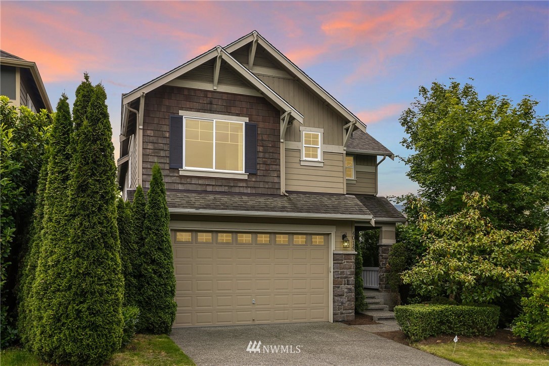 4014 167th Street Southeast Bothell, WA 98012 - Photo 38 of 39 a front view of a house with a garden