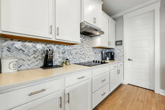 a view of entryway with stairs and wooden floor