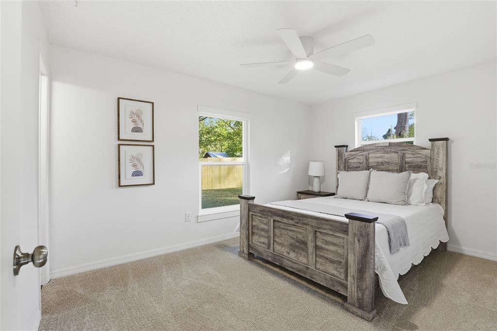 331 Northeast 2nd Street Williston, FL 32696 - Photo 21 of 29 a bed room with a bed and a window