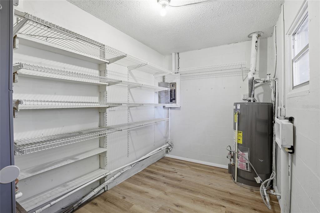 331 Northeast 2nd Street Williston, FL 32696 - Photo 25 of 29 a view of walk in closet with empty racks