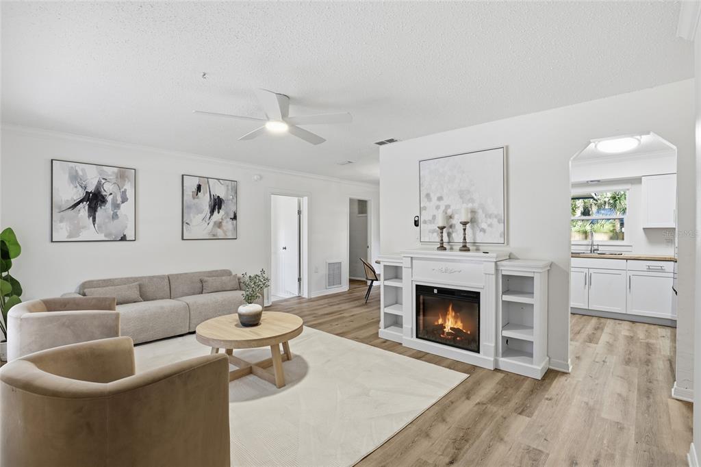 331 Northeast 2nd Street Williston, FL 32696 - Photo 7 of 29 a living room with furniture and a fireplace
